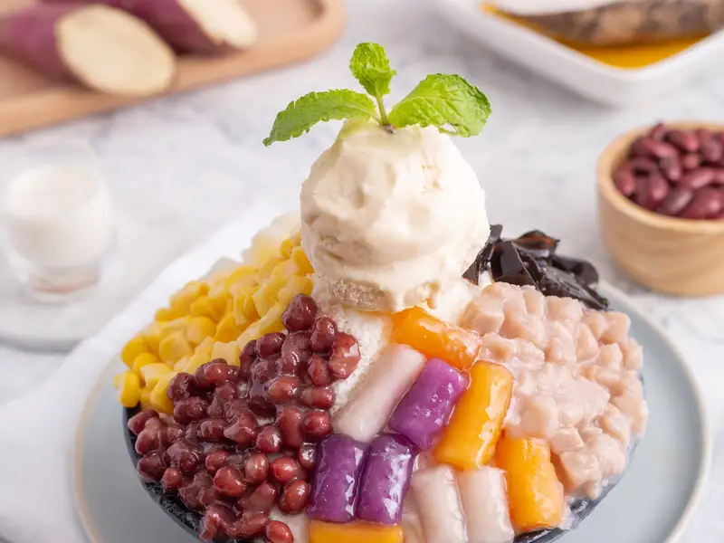 Bingsu with red beans, corn, taro and sweet potato and a scoop of ice cream